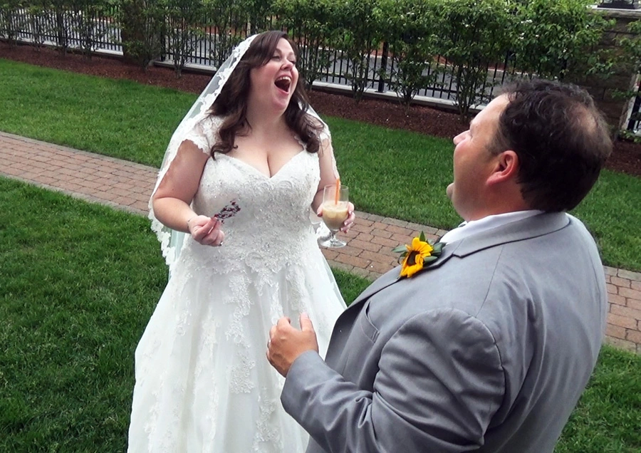 BostonStollingMagicianperformsforHappyBrideandGroom The Best in Magic Entertainment Boston Wedding Magician entertains Bride and Groom at Marriot in Quincy