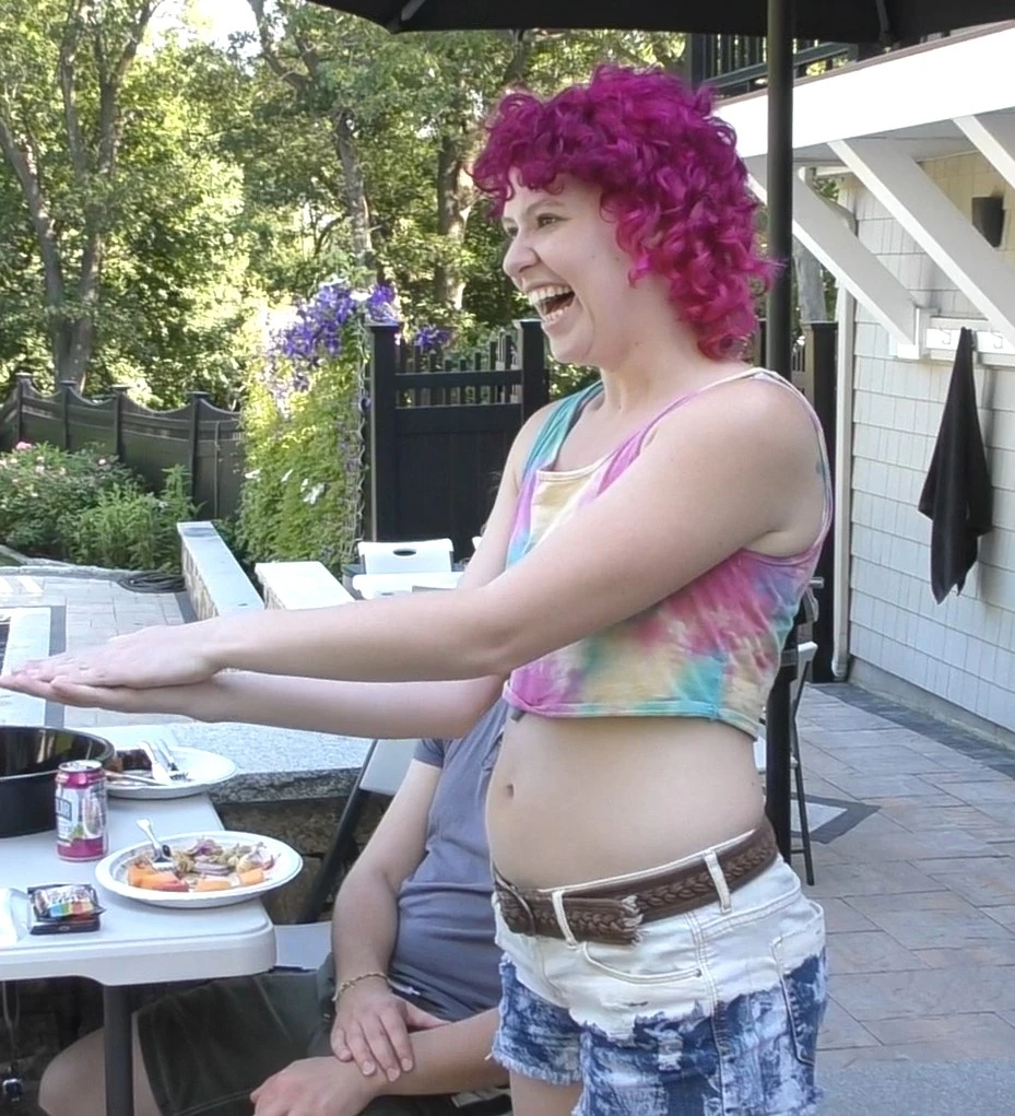 Massachusetts magician joe ferranti entertains by the pool Walk Around Boston Massachusetts Magician performs magic for a guest at a Pool Party