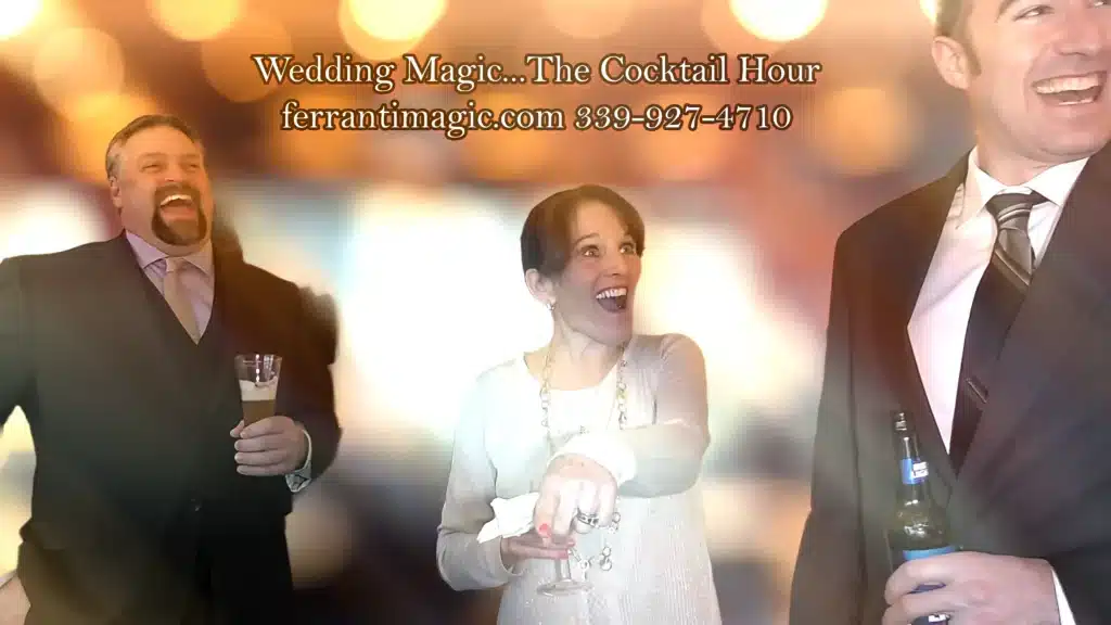 wedding magician boston massachusetts The Best in Magic Entertainment Boston magician Joe Ferranti entertains at a wedding cocktail hour three delighted and laughing spectators enjoy the Magic of joe ferranti